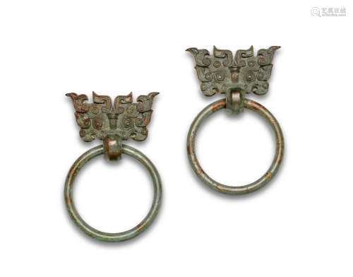 A fine pair of bronze taotie-mask loose-ring handles
