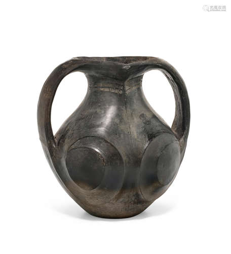 A BLACK POTTERY TWO-HANDLED AMPHORA