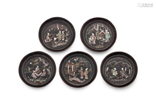 A set of five mother-of-pearl-inlaid black lacquer circular ...
