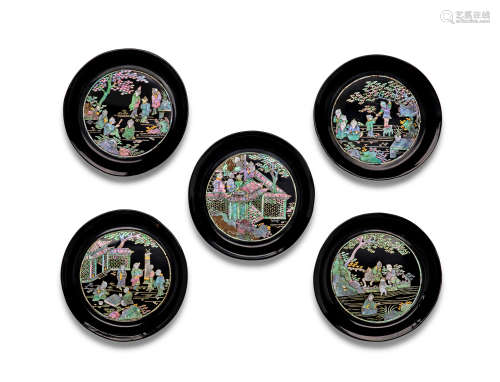 A set of five mother-of-pearl-inlaid black lacquer circular ...