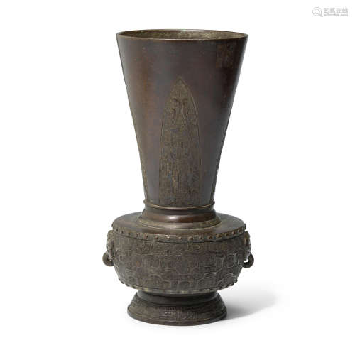 A large archaistic patinated bronze vase