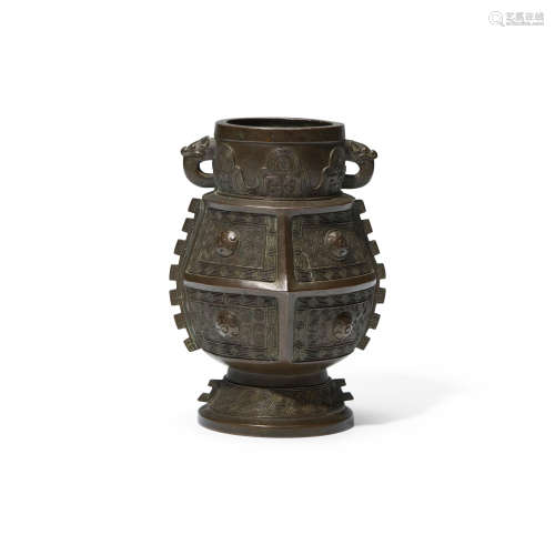 An archaistic patinated bronze vessel, fang hu