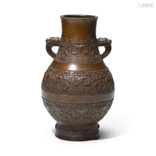 A superb archaistic coppery-bronze two-handled vase, Hu