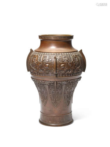 A large archaistic coppery-bronze baluster vase
