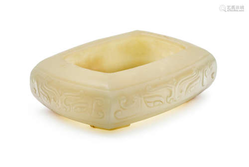 A carved pale yellow Jade Water Coupe