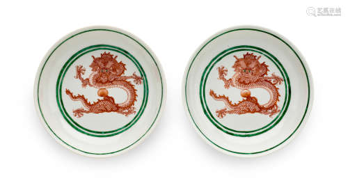 A pair of iron red and green enameled porcelain dragon dishe...