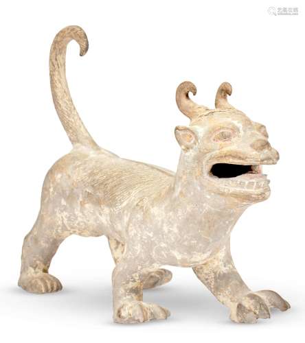 A Chinese Pottery Figure of a Long-Tailed Beast