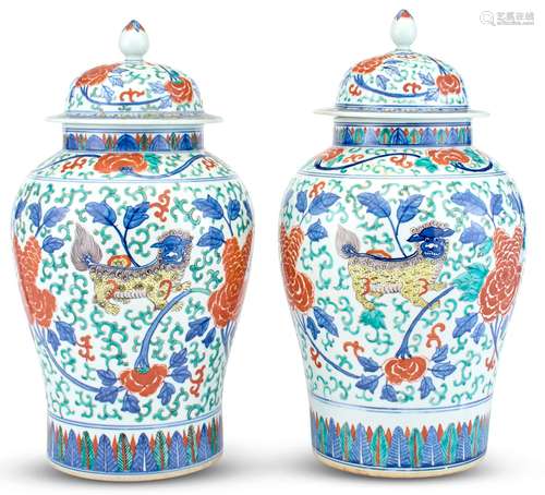 A Pair of Chinese Wucai Porcelain Baluster Jars and Covers