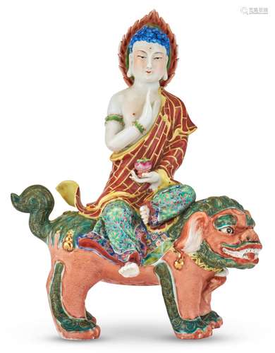 A Chinese Enameled Porcelain Figure of Buddha Shakyamuni