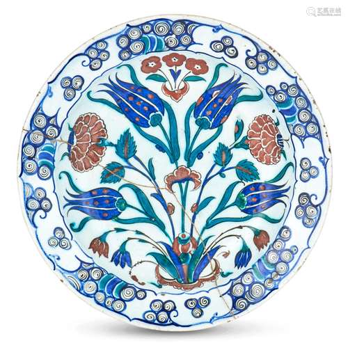 An Iznik Glazed Fritware Dish