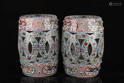 A pair of multicolored hollow dragon drum stools