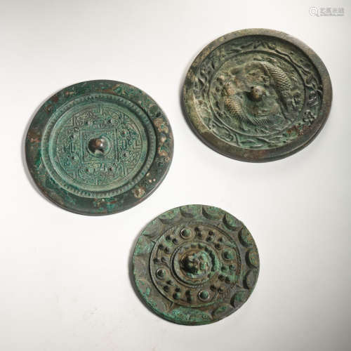 A GROUP OF ANCIENT CHINESE BRONZE MIRRORS