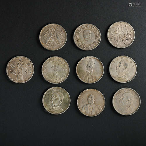 A GROUP OF ANCIENT CHINESE SILVER COINS