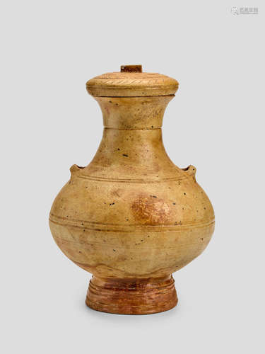 A STRAW-GLAZED EARTHENWARE HU SHAPED JAR