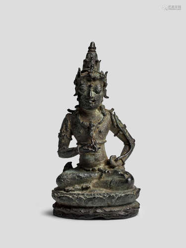 A COPPER ALLOY FIGURE OF A BODHISATTVA