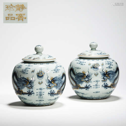 A PAIR OF BLUE AND WHITE GOLD PAINTED POT WITH LID, QING DYN...