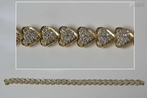 Bracelet en or jaune 18 carats à décor de "Coeurs"...