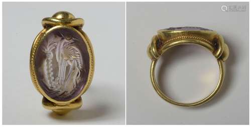 Bague sertie d'une intaille en améthyste gravée d'...