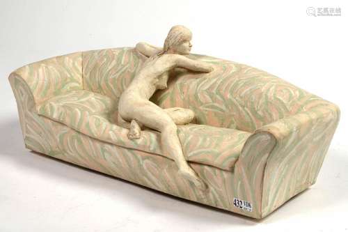 "Girl in sofa" en terre cuite polychromée. Signé V...