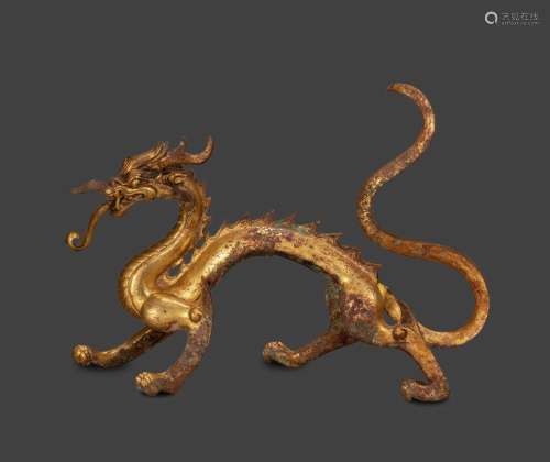 Ming Dynasty, A gilt bronze walking dragon