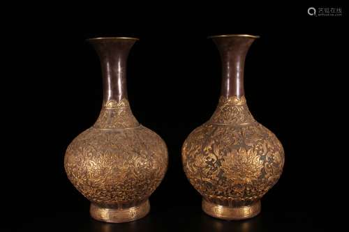 A Pair of Gilt Silver Vases