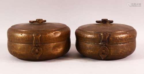 A PAIR OF INDIAN SPICE BOXES, both with hinged lid and handl...
