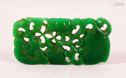 A CHINESE EMERALD COLOUR JADEITE CARVING, the carving depict...