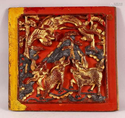 AN UNUSUAL CHINESE LACQUERED CARVED WOOD PANEL, the panel ca...