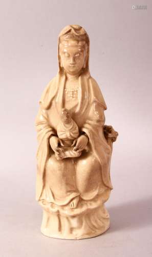 A CHINESE BLANC DE CHINE FIGURE OF GUANYIN AND CHILD - seate...