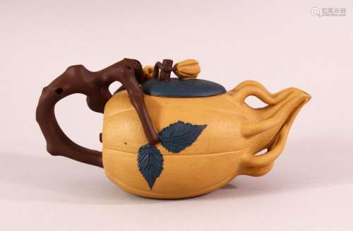 A CHINESE YIXING CLAY TEAPOT - with a beige ground, the pot ...