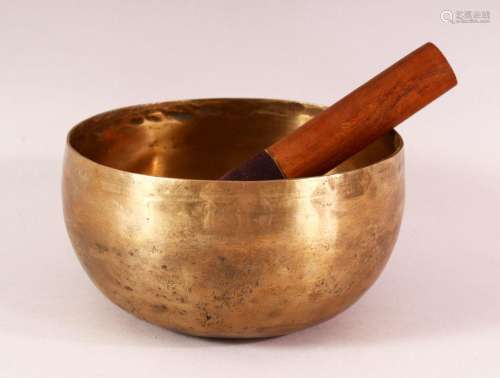 A 19TH CENTURY CHINESE TIBETAN BRASS MUSIC BOWL AND STICK - ...