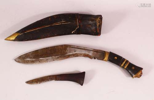 AN EASTERN HORN HANDLE & LEATHER SHEATH DAGGER SET, with...