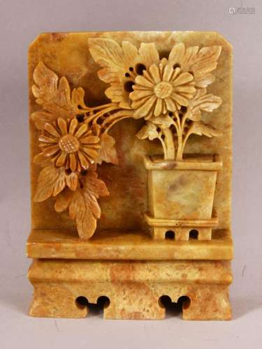 A CHINESE SOAPSTONE CARVING of a planter with flowers, 14.5c...