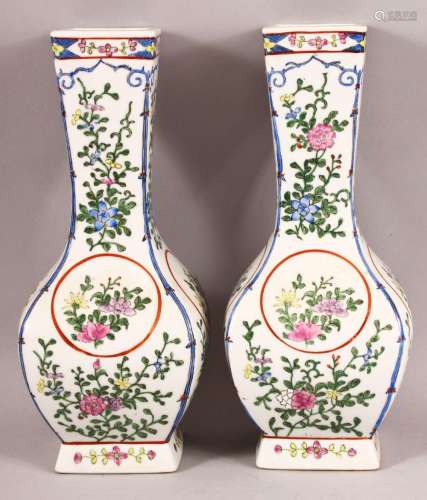 A PAIR OF CHINESE STYLE PORCELAIN VASES, painted with flower...