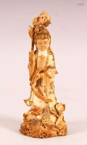 A CHINESE CARVED & POLYCHROME DECORATED IVORY FIGURE OF ...