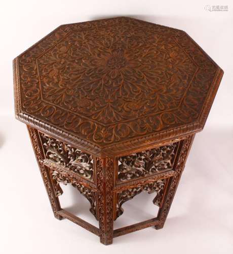 A FINE 19TH CENTURY INDIAN CARVED WOOD TRAVELLING FOLDING TA...