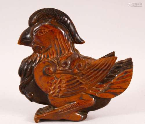 A GOOD CHINESE CARVED TIGERS EYE FIGURE OF A BIRD, carved wi...