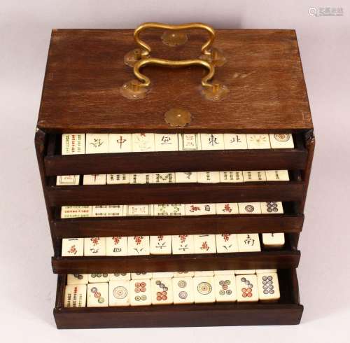 A CHINESE 20TH CENTURY MAH JONG SET IN WOODEN BOX - comprisi...
