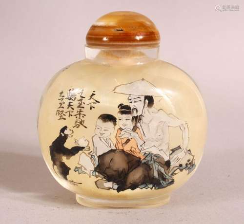 A CHINESE REVERSE PAINTED SNUFF BOTTLE - decorated with figu...