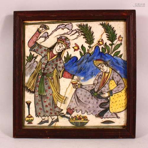 A 19TH CENTURY PERISAN PORCELAIN TILE PANEL - depicting two ...