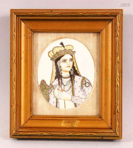 A 19TH CENTURY INDIAN IVORY SLITHER PAINTING OF A FEMALE - t...