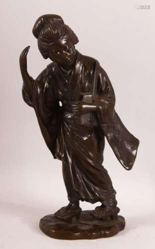 A GOOD JAPANESE MEIJI BRONZE FIGURE OF A GEISHA holding a mu...