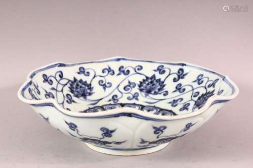 A CHINESE MING STYLE BLUE & WHITE PORCELAIN MOULDED BOWL...