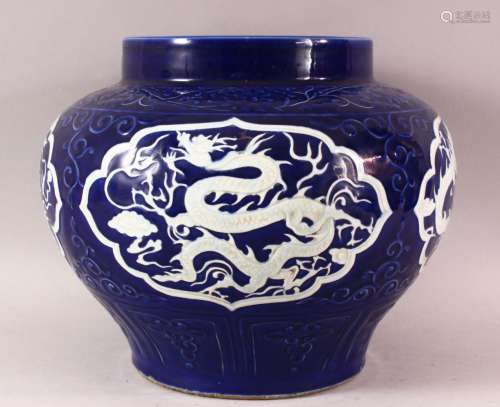 A CHINESE MING STYLE BLUE GLAZED PORCELAIN DRAGON JAR, with ...
