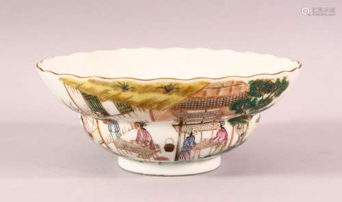 A CHINESE FAMILLE VERTE PORCELAIN BOWL, the sides painted wi...