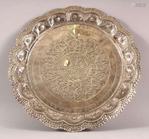 A SRI LANKAN POSSIBLY SILVER DISH, with embossed and chased ...