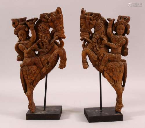 A PAIR OF 19TH CENTURY SOUTH INDIAN CARVINGS OF HORSE RIDERS...