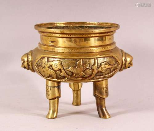 A CHINESE TWIN HANDLED TRIPOD CENSER, the base with six char...