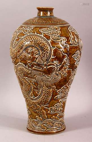 A CHINESE BROWN GLAZED POTTERY DRAGON VASE, the vase with wi...