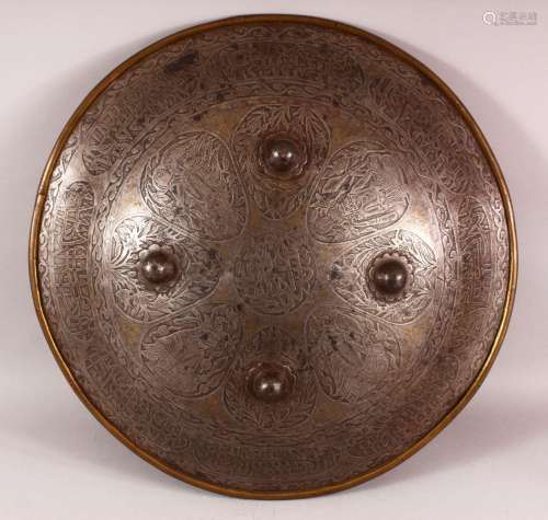 A PERSIAN QAJAR STEEL SHEILD, with etched decoration of figu...